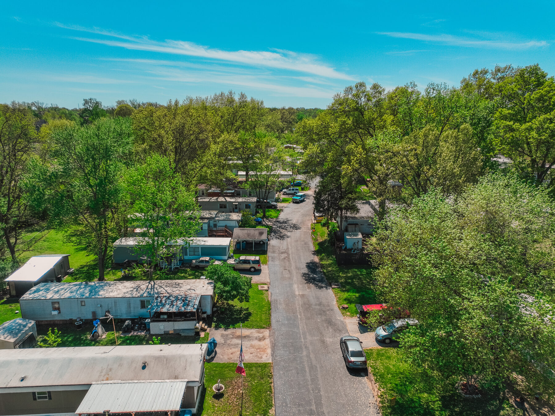 Aerial view of a street through Muegge Manor manufactured housing community